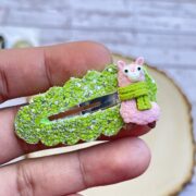 Cute little pink lama snap clip on green glitter faux leather – $4 – 2.2