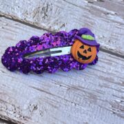purple glitter with pumpkin snap clip – $4 – 2.6